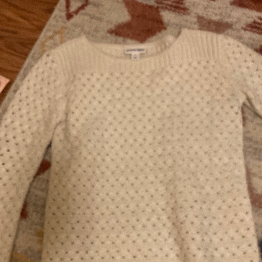 Cream sweater great shape only were a couple times. Smoke free home.